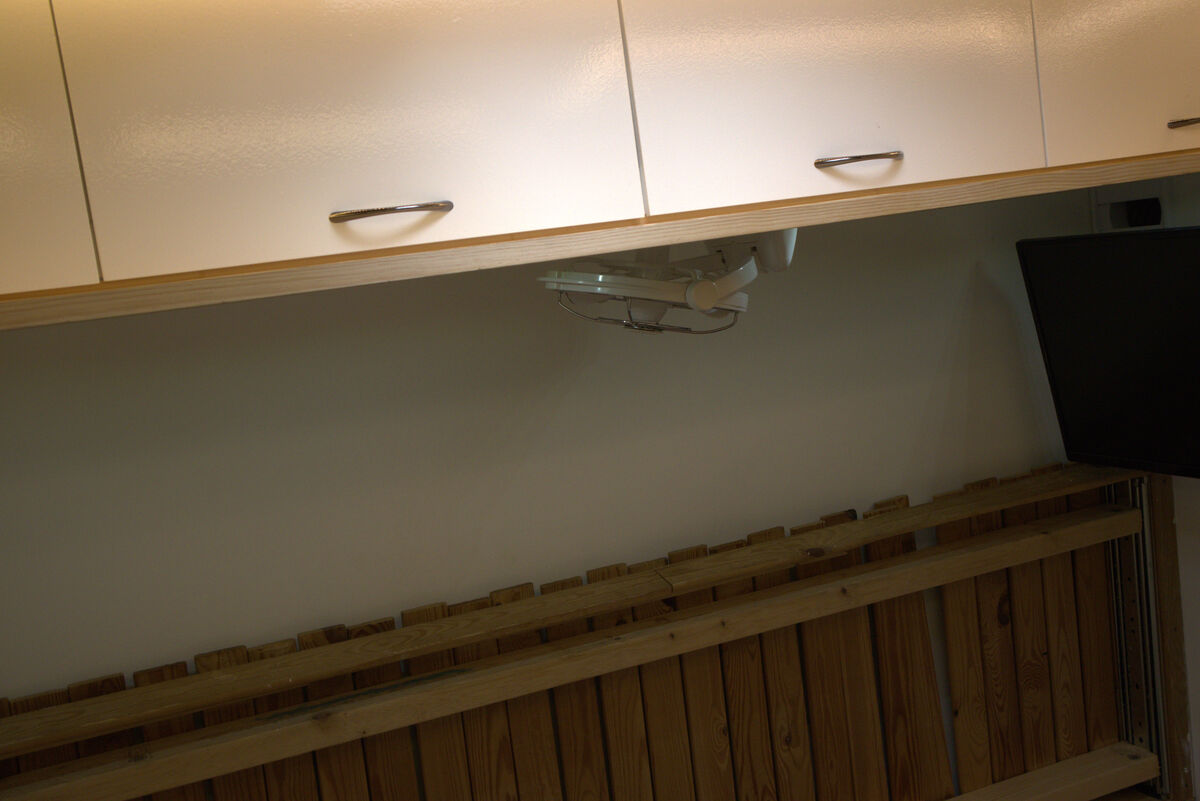 12V swivel fan mounted above the bed area